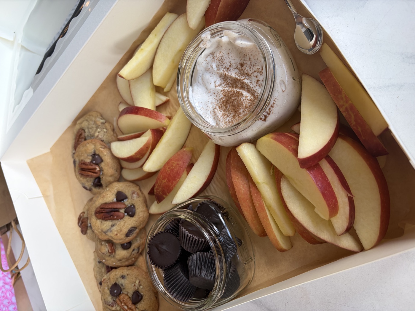 Apples, cookies, and sweet treats served at book club